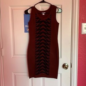 Maroon and black body con dress.